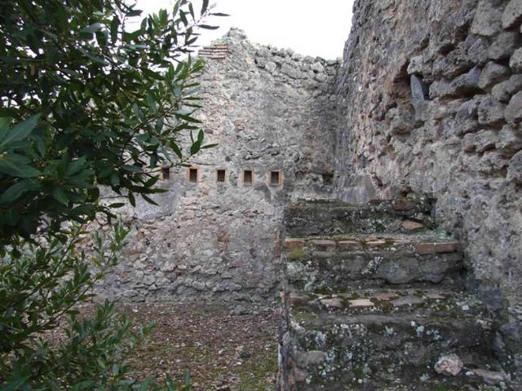 IX.2.24 Pompeii. March 2009. Staircase and south west corner of yard.