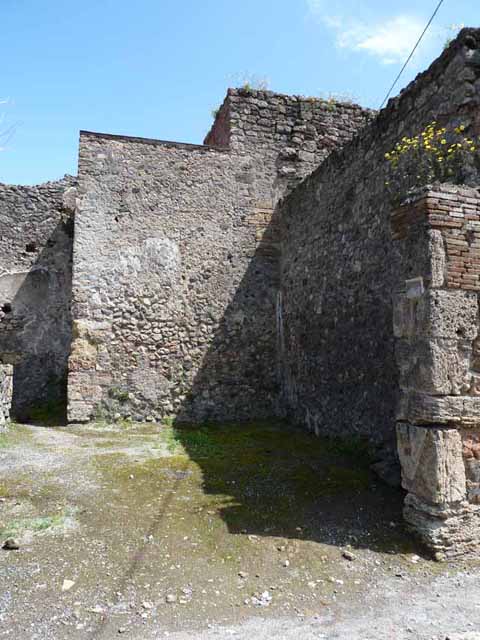 IX.3.4 Pompeii. March 2009. East wall of rear room in north-east corner of shop.