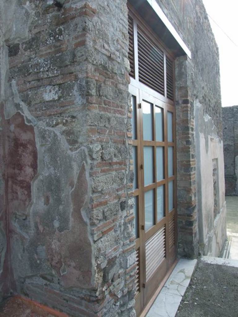 IX.3.5 Pompeii. March 2009. South wall of garden area, showing window from triclinium, room 14.