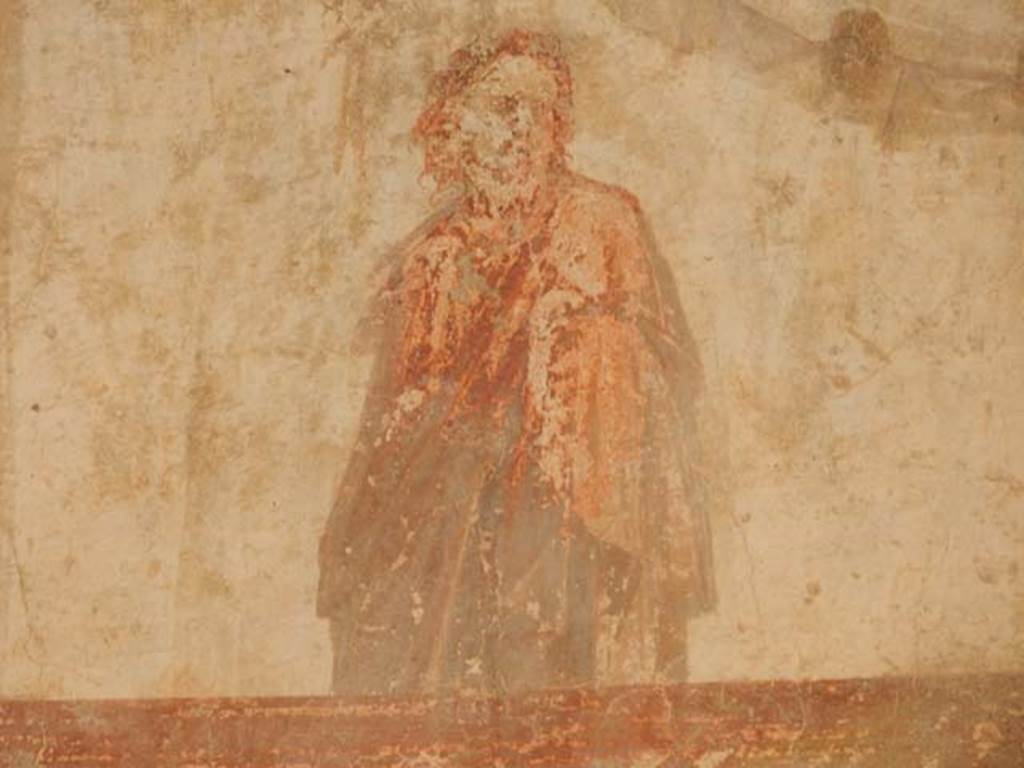 IX.3.5 Pompeii. May 2015. Room 13, detail of figure at upper east end of south wall.
Photo courtesy of Buzz Ferebee.