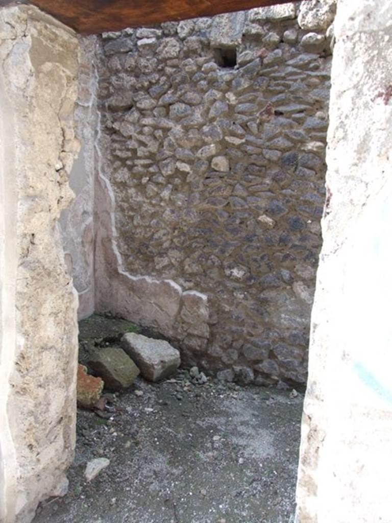 IX.3.5 Pompeii. March 2009.
Room 2, small room on north side of entrance fauces, looking north at west end.