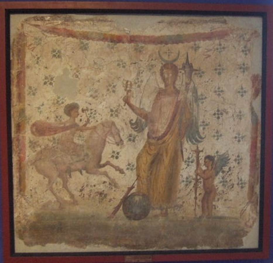 IX.3.7 Pompeii.  Picture of Isis Fortuna with horn of plenty and sistrum and with a foot on a globe. 
To the right is Hesperus and left is Helios or Harpocrates - Helios.
Now in Naples Archaeological Museum, where it is shown as from IX.3.15. 
Fr�hlich says this picture was found on the north wall of the shop IX.3.7.
He points out that the painting was described by Panofka in 1847, so it could not be IX.3.15 which was first excavated in 1861.
See Fr�hlich, T., 1991, Lararien und Fassadenbilder in den Vesuvst�dten.  Mainz: von Zabern.  (L101: p.294).

Others believe the painting of Isis-Fortuna (MN 8836) was found in 1847 in IX, iii, 15 on the north wall of a cubiculum.  
It was discovered while carrying out work on one of the walls of the Casa di Suonatrici which joined the two houses. 
Our thanks to Raffaele Prisciandaro for his help in identifying the following sources:
Casa di Philocalus; parete N del cubicolo; CIL 04, 882 (197); 
Bulletino Archeologico Italiano, 1, 1862, n. 20, 1862, pp. 159 160; 
Panofka, BdI 1847, pp. 127-128 �nell�appoggiar una delle mura della casa delle Suonatrici si � scoperta al muro della casa accanto una pittura �� 

According to PPM, there was no agreement on whether the painting depicting Isis-Fortuna, now at Naples Museum, came from this shop.
See Bragantini I., in 1990-2003. Pompei: Pitture e Mosaici.  Roma: Istituto della enciclopedia italiana, Vol. IX, p.314, p. 335.
