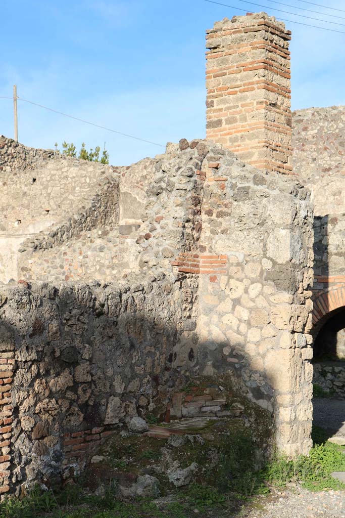 IX.3.10 Pompeii. December 2018.
Masonry remains on north side of doorway linking shop to bakery. Photo courtesy of Aude Durand.