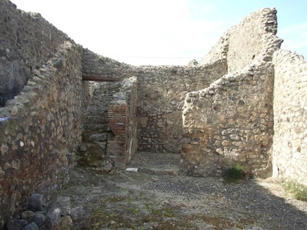 IX.3.16 Pompeii. March 2009. Looking north from workshop to steps to upper floor and rear room.