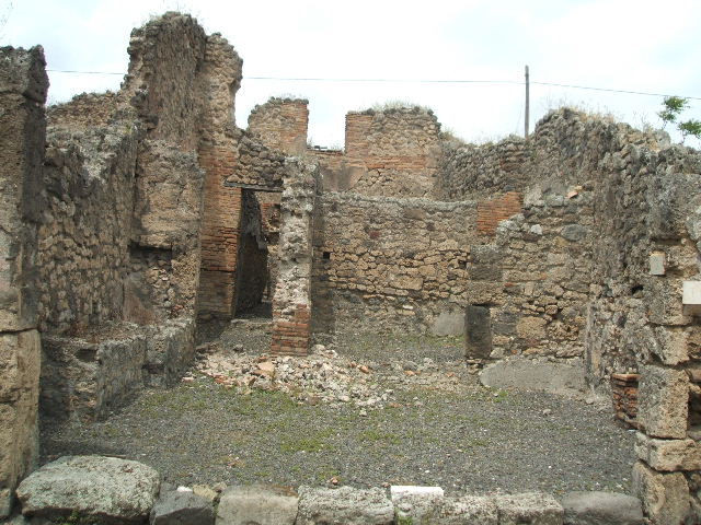 IX.3.17  Pompeii.  March 2009.  Altar on east wall of workshop.