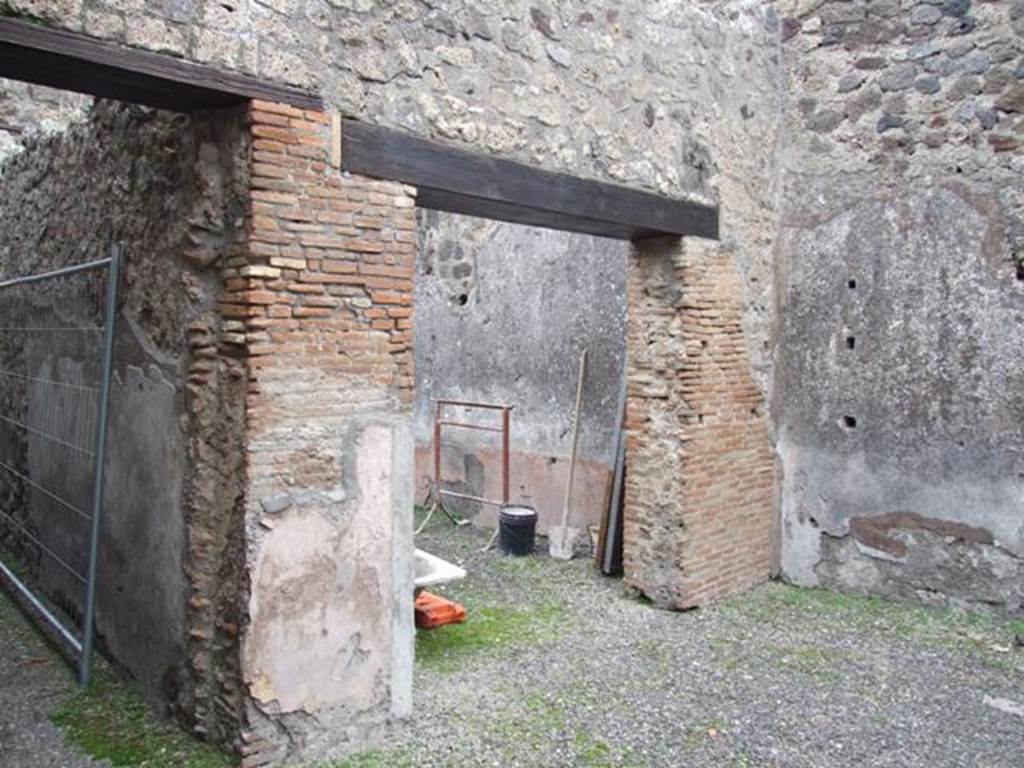 IX.3.19. Taberna T. Genialis. December 2007. Room 10. Looking at entrance to room 13 on right, and corridor to bakery on left.