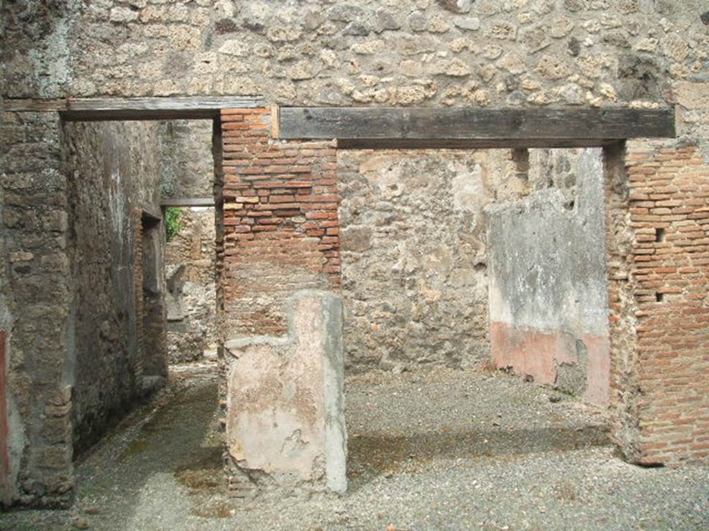 IX.3.19. Taberna T. Genialis. May 2005. Room 10. Entrance to room 13 on right, and corridor to bakery on left.