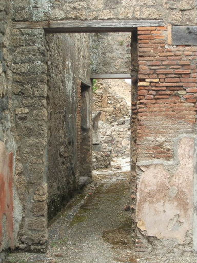 IX.3.19. Taberna T. Genialis. May 2005. Room 10. Looking north along corridor to bakery.