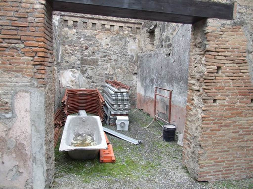 IX.3.19 Pompeii. December 2007. Room 13, a triclinium. According to PPP, the only known decorations of this room were in the panels, and showed vignettes of female flying figures.
According to Fiorelli, “There were two tricliniums lit by windows, the first of which was decorated with two figures of Baccantes, one with thyrsus in hand and a basket on the head, the other carrying a thyrsus in the right hand and a vase in a basket in the left hand. There was also a head of Diana, facing forward, with quiver on the shoulder.”
See Pappalardo, U., 2001. La Descrizione di Pompei per Giuseppe Fiorelli (1875). Napoli: Massa Editore. (p.147)
and Fiorelli, G., (1875). Descrizione di Pompei, (p.397-8)
