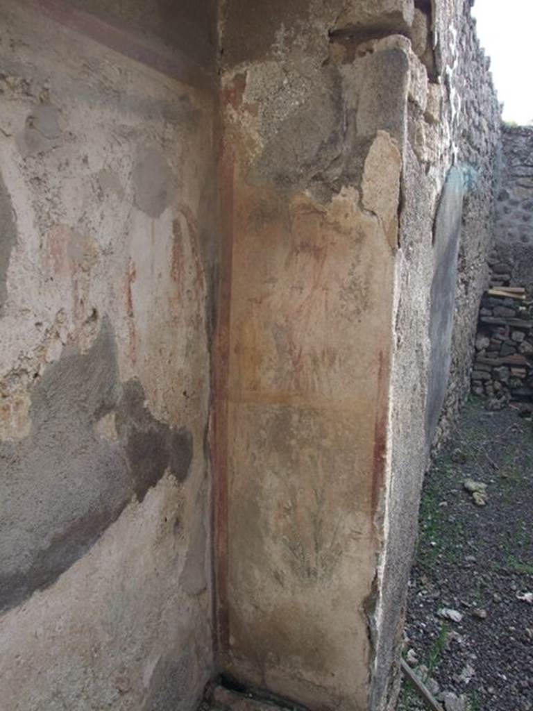 IX.5.2 Pompeii. December 2007. Room �w�, remains of painting on household shrine south side wall.
