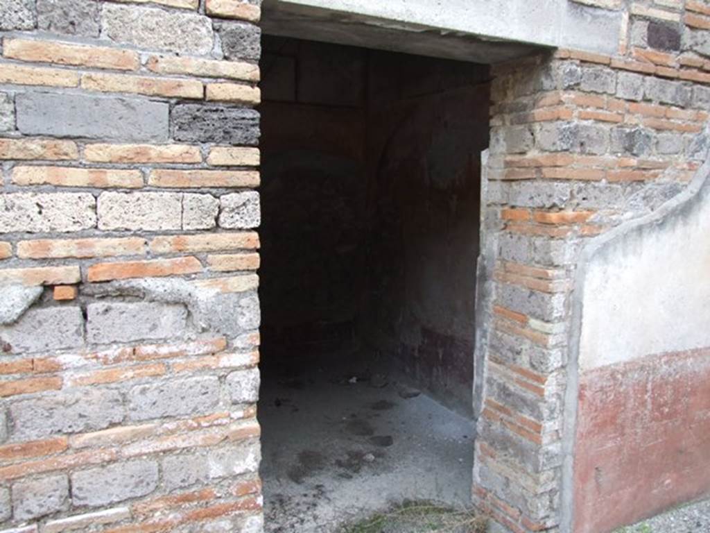 IX.5.6 Pompeii. December 2007. Doorway to room 7, on east side.  
According to Sogliano, some of the paintings visible in this room on excavation were �  Hera and her attributes - peacock and a globe and sceptre (no.91) Wall painting of Apollo and woman of his love, according to Sogliano �completely destroyed� (no.108). See Sogliano, A., 1879. Le pitture murali campane scoverte negli anni 1867-79. Napoli: (p.24, no.91 and p.27, no.108)
