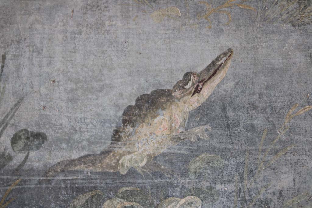 IX.5.9 Pompeii. May 2019. Room �l (L)�, detail of crocodile from east end of north wall.   
Foto Christian Beck, ERC Grant 681269 D�COR.
