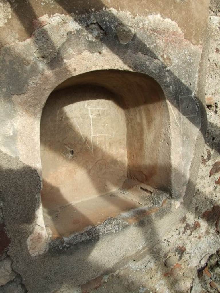 IX.5.9 Pompeii. December 2007. Room �n�, arched niche in north wall of kitchen. 