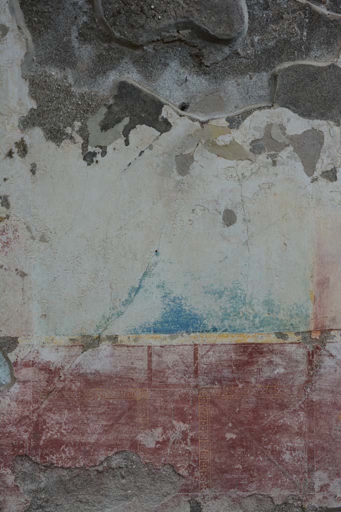 IX.5.11 Pompeii. March 2017. 
Room I (L), zoccolo below blue painted central panel on east wall.
Foto Christian Beck, ERC Grant 681269 D�COR.

