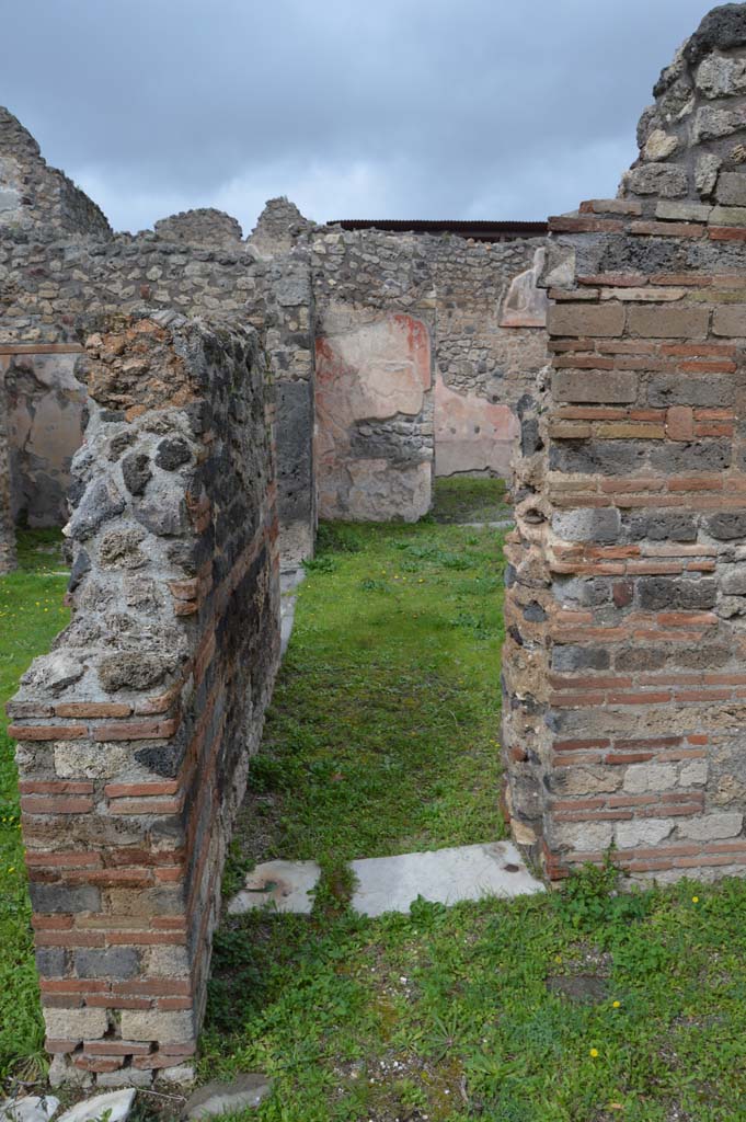 IX.5.14 Pompeii. March 2018. Looking through doorway in north wall in room �m�, towards atrium
Foto Taylor Lauritsen, ERC Grant 681269 D�COR.
