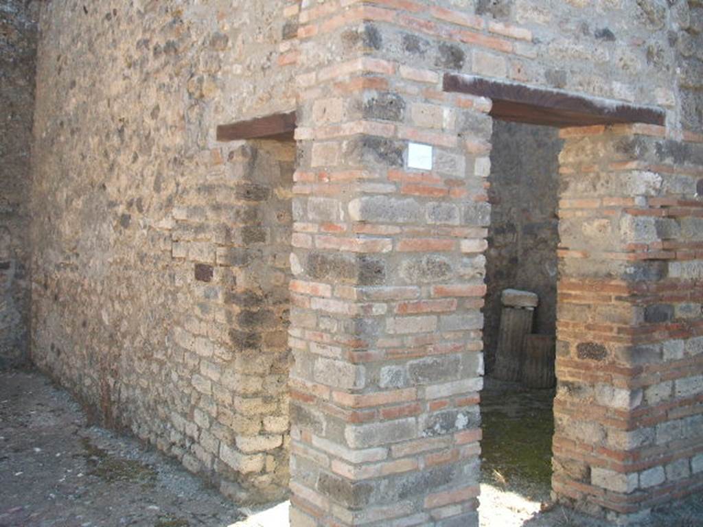 IX.5.14 Pompeii. May 2005. Looking south-east towards third exedra or triclinium, room �o�, with two doorways.
One doorway in the south wall of the second exedra �n�, one doorway from the east portico.
See Eschebach, L., 1993. Geb�udeverzeichnis und Stadtplan der antiken Stadt Pompeji. K�ln: B�hlau. (p.425) 
According to Richardson and Schefold, three paintings were found in triclinium �o�.
Schefold describes triclinium �o� as triclinium l. v. der N-Ala, which equates to room �f��.
According to PPP and PPM they were found in room �f�. See our room �f� for these paintings.
All now in Naples Archaeological Museum.
Pyramus and Thisbe. Naples Inventory number 111483. 
Pair of men before an enthroned queen (Aeneas before Dido?). Naples Inventory number 111480. 
Bacchus and Ariadne with thiasus. Naples Inventory number 111481.
See Bragantini, de Vos, Badoni, 1986. Pitture e Pavimenti di Pompei, Parte 3. Rome: ICCD, p. 482-3. 
See Carratelli, G. P., 1990-2003. Pompei: Pitture e Mosaici.  Roma: Istituto della enciclopedia italiana, Vol IX, pp. 623-634. 
See Richardson, L., 2000. A Catalog of Identifiable Figure Painters of Ancient Pompeii, Herculaneum. Baltimore: John Hopkins, p. 153.
See Schefold, K., 1957. Die W�nde Pompejis. Berlin: De Gruyter, p. 260.

