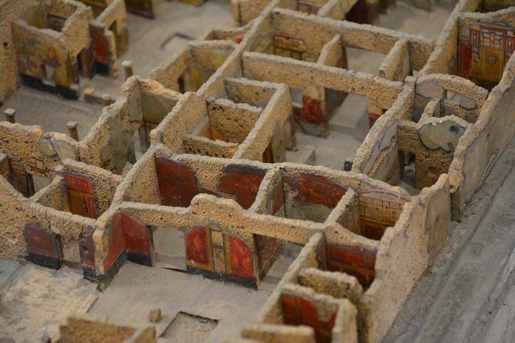 IX.5.14 Pompeii. July 2017.
Looking north towards doorways to room l (L) on left, triclinium f and north ala e, on north side of atrium, and north wall of room d, with doorway from north ala e.
Above these rooms are IX.5.9, upper left, and IX.5.11, upper right.
From cork model in Naples Archaeological Museum.
Foto Annette Haug, ERC Grant 681269 DÉCOR