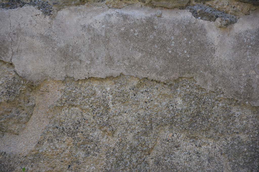IX.5.17/6 Pompeii. May 2017. Room x, detail of remaining plaster on lower west wall.
Foto Christian Beck, ERC Grant 681269 D�COR.
