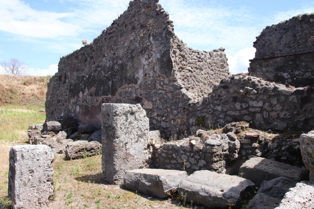 IX.6.4 Pompeii. May 2024.
Looking east along south wall from area of room in south-west corner, with stairs to upper floor on its east side. Photo courtesy of Klaus Heese.