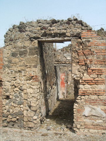 IX.6.d Pompeii. May 2005. North wall of triclinium with window into light-yard. Found on the north wall on either side of the window were wall paintings of Sirens, one with lyre, the other with flute. See Schefold, K., 1957. Die Wande Pompejis. Berlin: De Gruyter. (p.267) See Sogliano, A., 1879. Le pitture murali campane scoverte negli anni 1867-79. Napoli: (p.71, nos.427 and 428)