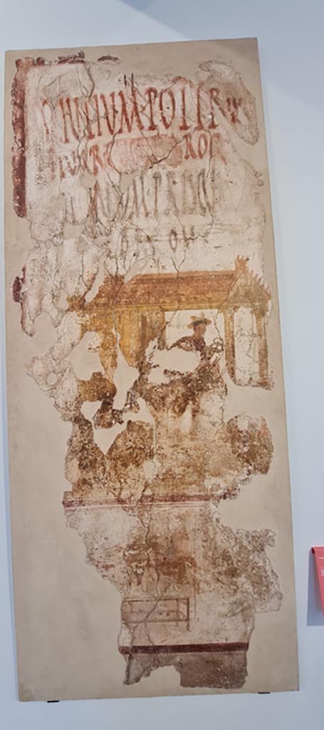 IX.7.7 Pompeii. April 2022.
Fresco with electoral inscription from left (west) of doorway, photographed on display in Antiquarium.
Photo courtesy of Giuseppe Ciaramella.