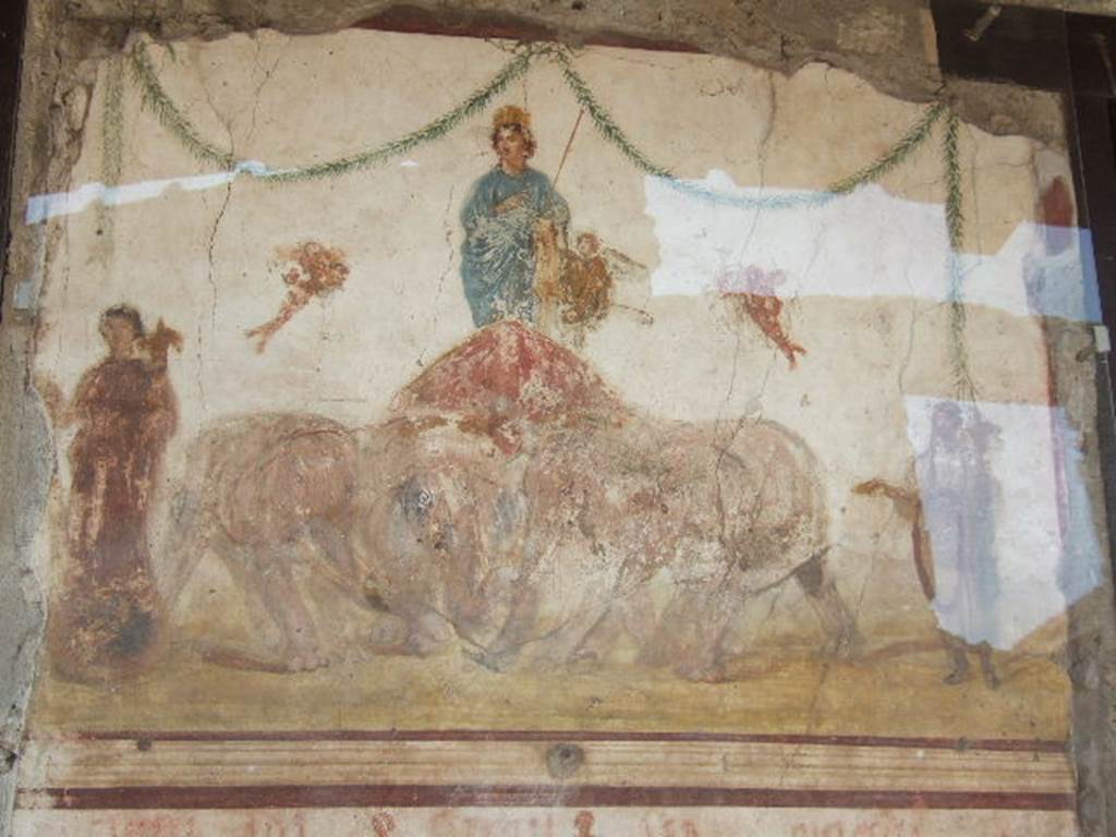 Between IX.7.7 and IX.7.6 Pompeii. May 2006, Upper part of painting of Venus riding in a chariot pulled by elephants, from pilaster on east side of doorway.