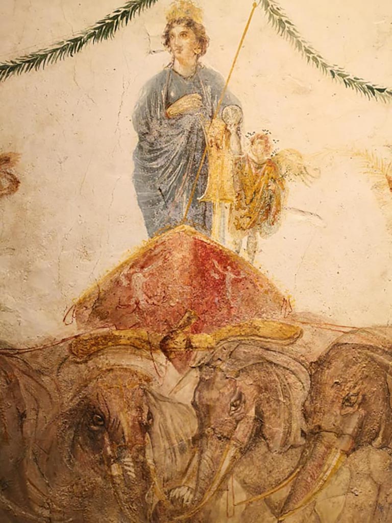 Between IX.7.7 and IX.7.6 Pompeii.
Venus riding in a chariot pulled by elephants, from pilaster on east side of doorway.
From the exhibition “Pompei e Santorini”, Rome, 2019. Photo courtesy of Giuseppe Ciaramella.