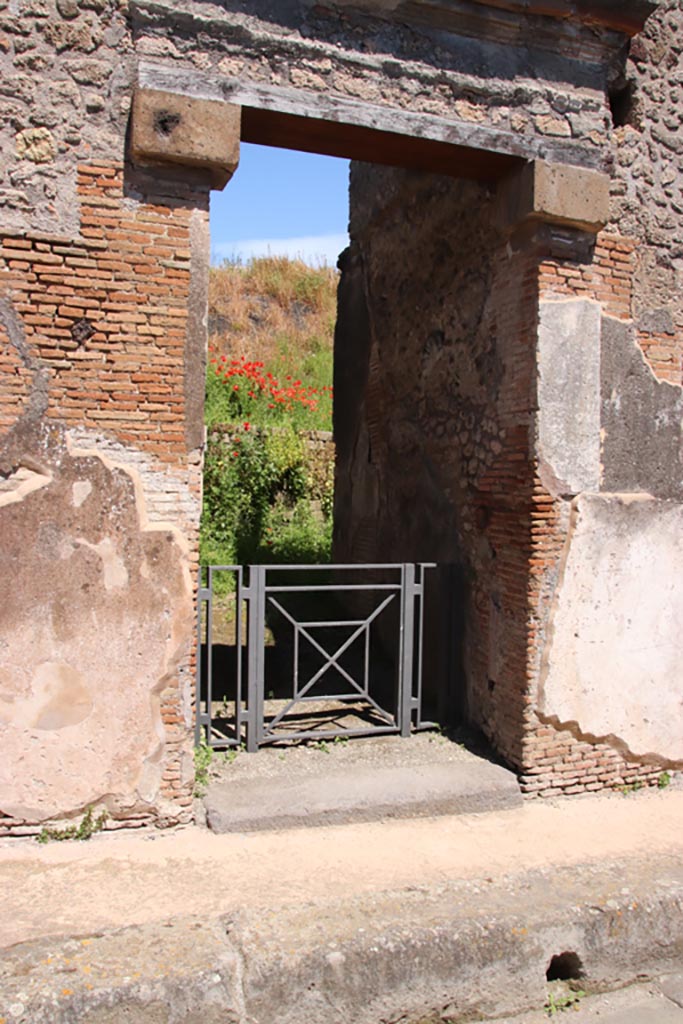 IX.7.16 Pompeii. May 2024.
Looking towards south side of entrance doorway. Photo courtesy of Klaus Heese.