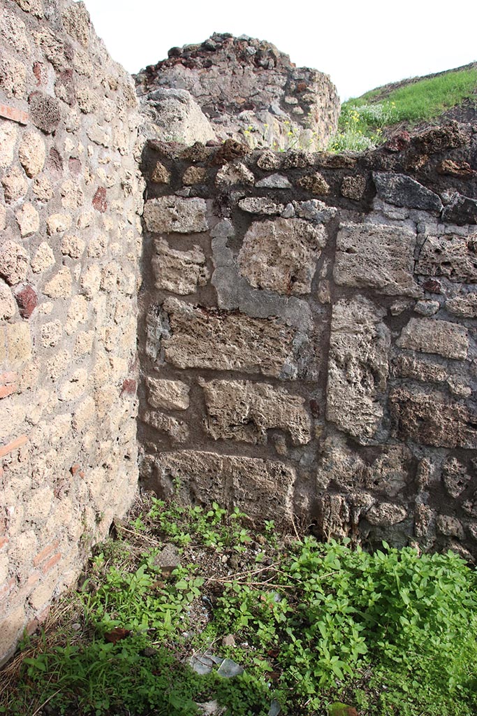 IX.7.19 Pompeii. October 2024.
Corridor f, blocked doorway at north end of east wall. Photo courtesy of Klaus Heese.