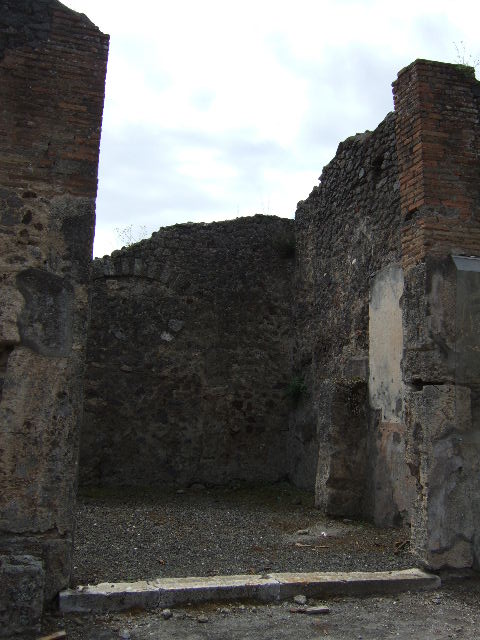 IX.8.2 Pompeii.  March 2009.  West wall of front room of shop, with window to IX.8.1.