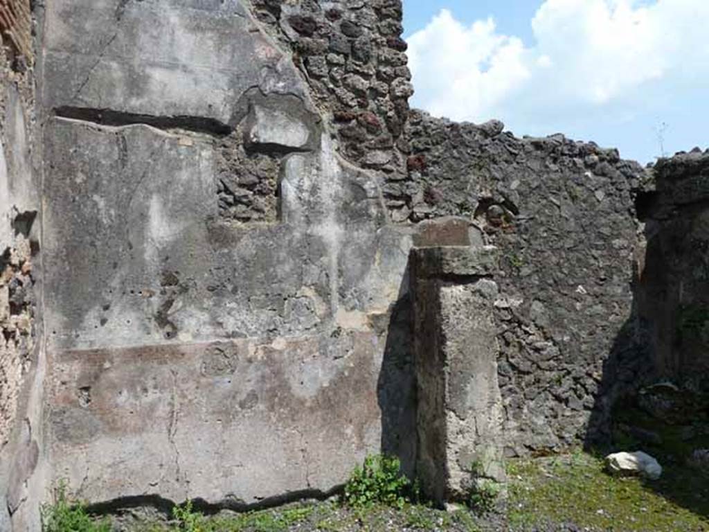 IX.8.2 Pompeii. May 2010. East wall of front and rear rooms.
According to Garcia y Garcia, a painting of a sacred landscape would have been seen in the centre of the east wall. This was soon lost and is no longer visible. Two drawings of the painting can be found in the German Archaeological Institute of Rome. See Garcia y Garcia, L., 2005. Pupils, Teachers and Schools in Pompeii. Roma: Bardi editore. (p. 72-3, with figs 41-42 showing two drawings of the sacred landscape).
See De Carolis, E. 1989. Italienische Reise. Naples: Bibliopolis, (p. 250 & fig. 93 on page 323) There was a frieze on a black background on the upper walls. A small trace survived on the east wall, depicting figures of philosophers. Five drawings of these can be seen in Fig.120, of Schefold, but it says they were found at the shop at IX.8.4.
See Schefold, K., 1962. Vergessenes Pompeji. Bern: Francke. (Fig.120)