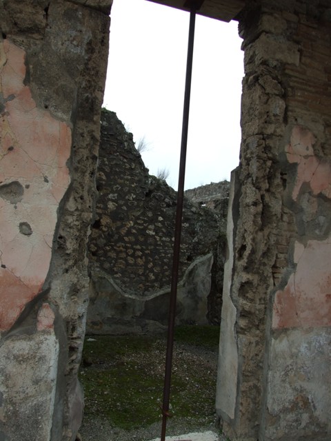 IX.8.6 Pompeii. March 2009. Room 11, Mosaic in threshold of side door from andron.
