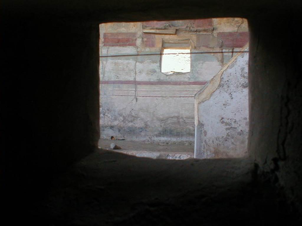 IX.8.6 Pompeii. September 2004. Room 18, Looking into Nymphaeum through duct in service corridor.