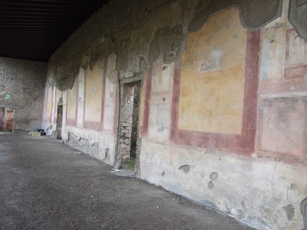 IX.8.6 Pompeii. December 2007. West portico, looking south. Schefold describes six large panels separated by seven views which are framed. These framed views are of wind gods shown with winged heads. They are listed as (from south to north) Boreas, Oceanus, Zephyr, then two gaps, Apeliotes, Euros or Notos, See Schefold, K., 1957. Die Wände Pompejis. Berlin: De Gruyter. (p. 276).