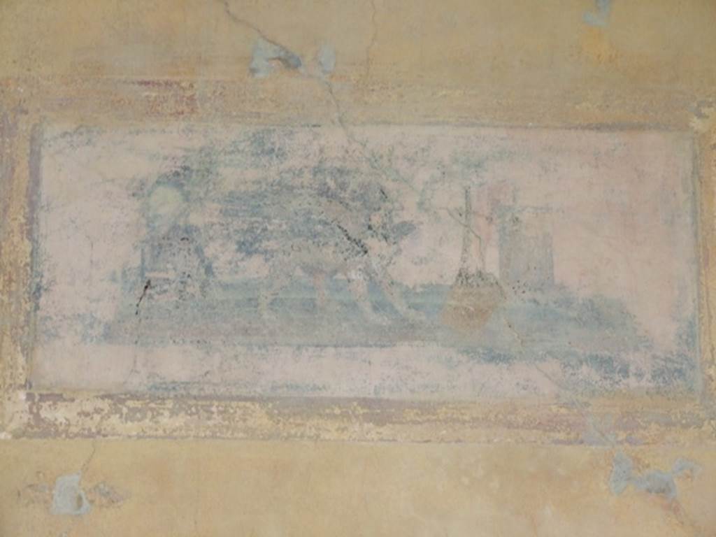 IX.8.6 Pompeii. December 2007. West portico, third panel from the north. Painted panel of the attributes of Apollo. See Schefold, K., 1957. Die Wände Pompejis. Berlin: De Gruyter. (p. 276).See Sogliano, A., 1879. Le pitture murali campane scoverte negli anni 1867-79. Napoli: Giannini. (p.27, no.107)