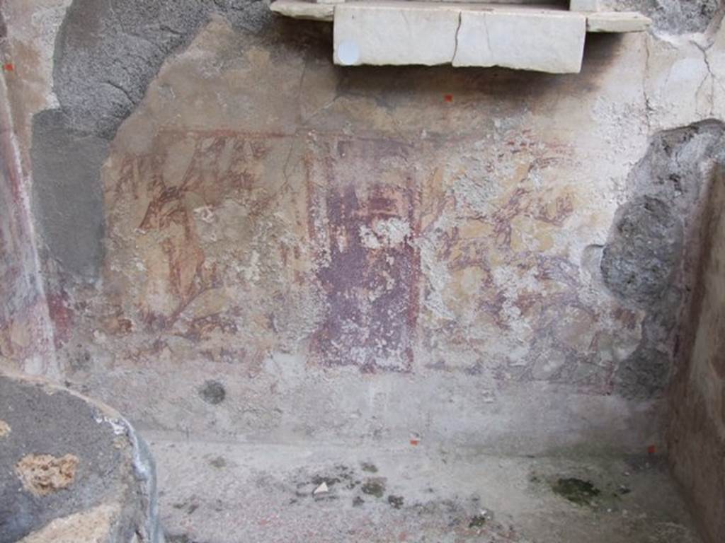 IX.8.6 Pompeii. March 2009. Room 23. Remains of painted plaster under niche on south wall.