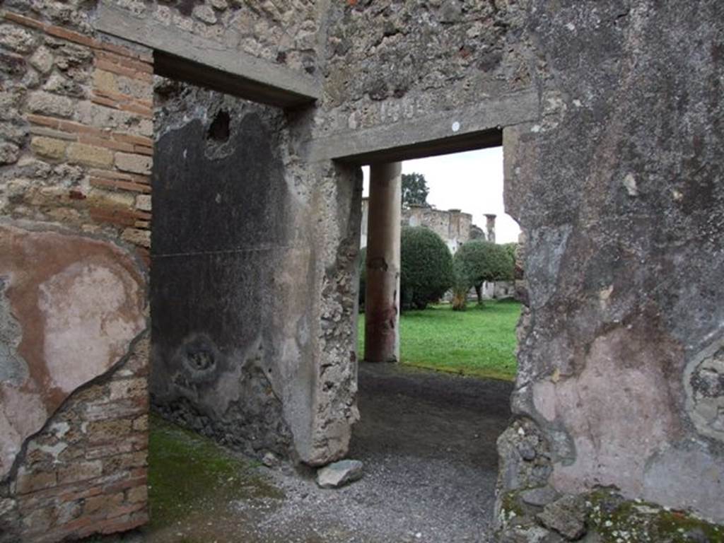 IX.8.6 Pompeii. March 2009. Doorway to Room 30 Corridor leading north.
Looking east through doorway to West Portico