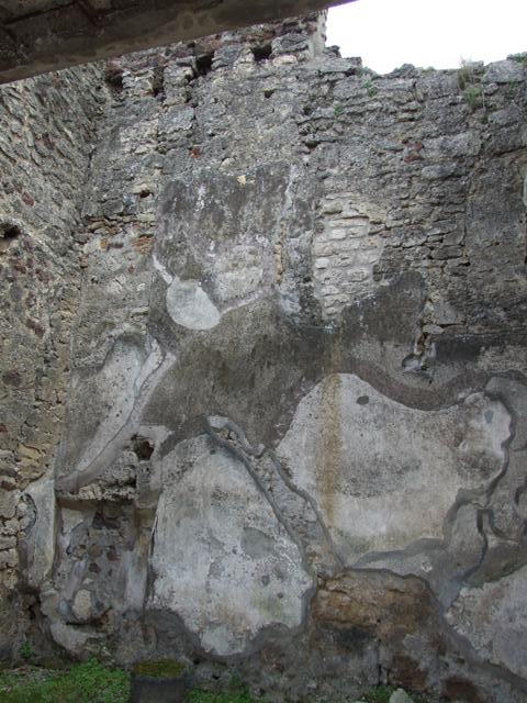 IX.9 Pompeii.  May 2010.      Vicolo looking south.        Side wall of  IX.8.7