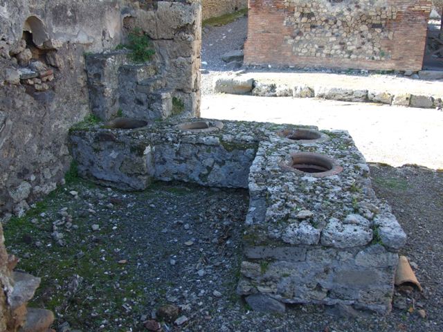 IX.9.1 Pompeii. March 2009. Remains of niche. Boyce described it as a vaulted niche with white stucco coating the inside walls. He quoted Not.Scavi, 1888, 514 as his source. See Boyce G. K., 1937. Corpus of the Lararia of Pompeii. Rome: MAAR 14. (p.90)