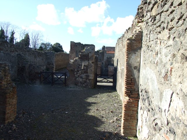 IX.9.2 Pompeii. March 2009. Doorway to rear room on west side, tablinum.