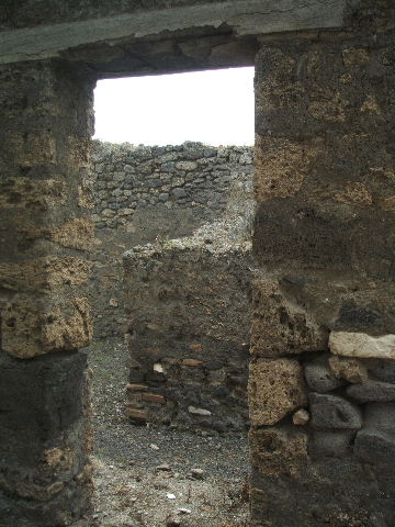 IX.9.9 Pompeii. May 2005. Entrance doorway, looking west.