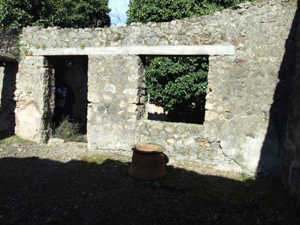 IX.9.11 Pompeii. March 2009. Garden area. East wall with doorway to atrium and window to Tablinum,