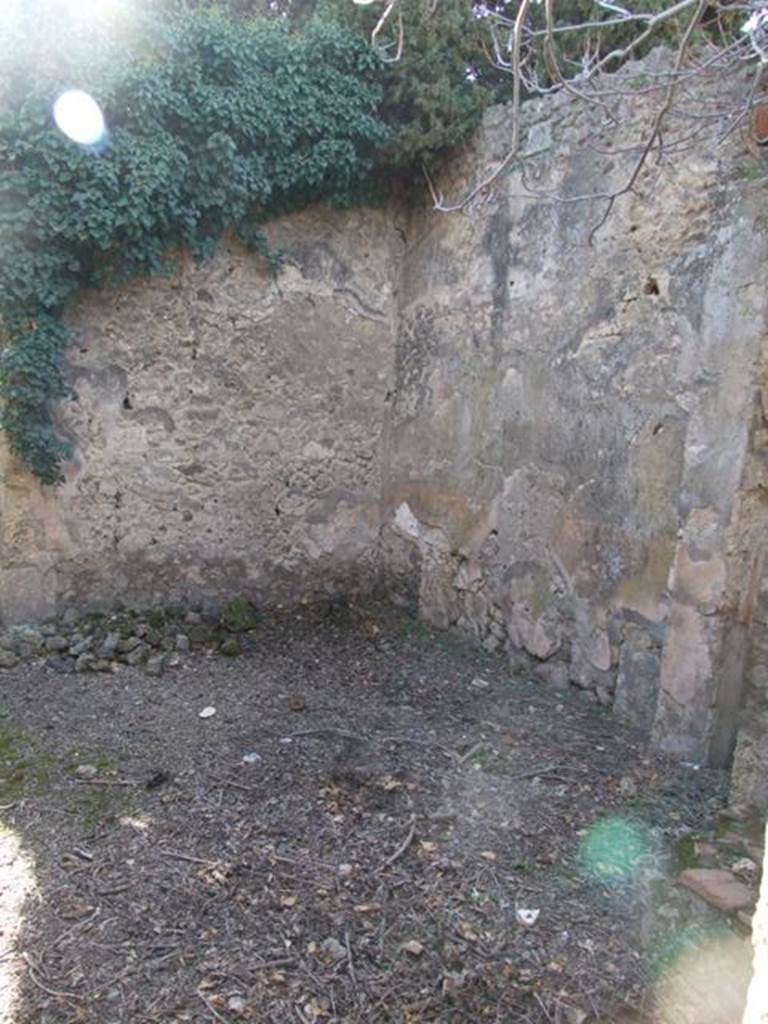 IX.9.11 Pompeii. March 2009. South side of atrium with doorway to room 2, cubiculum or sacellum.