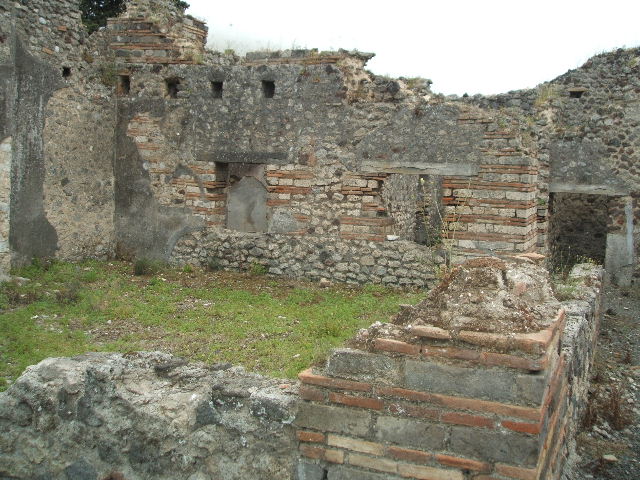 IX.9.a Pompeii.  March 2009. Doorway to Kitchen and Latrine.