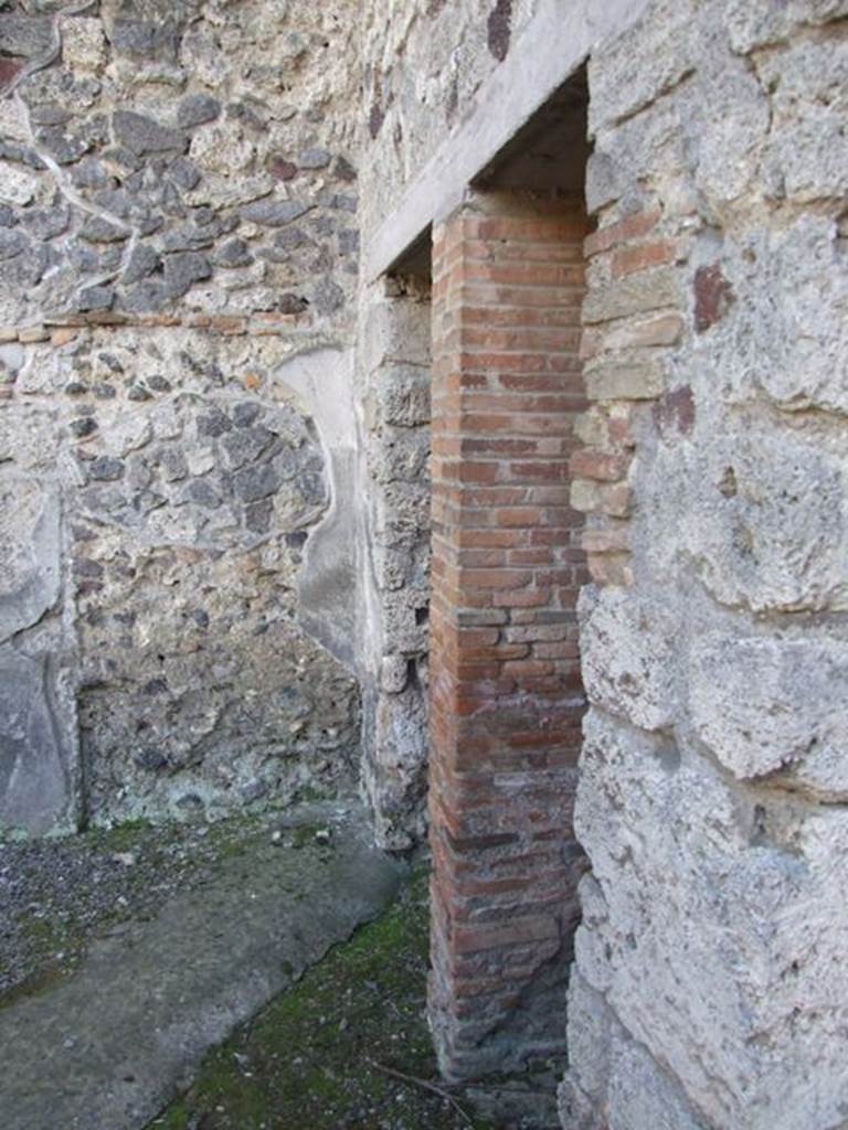 IX.9.c Pompeii. March 2009. Doorways to Anteroom in south west corner of Portico.