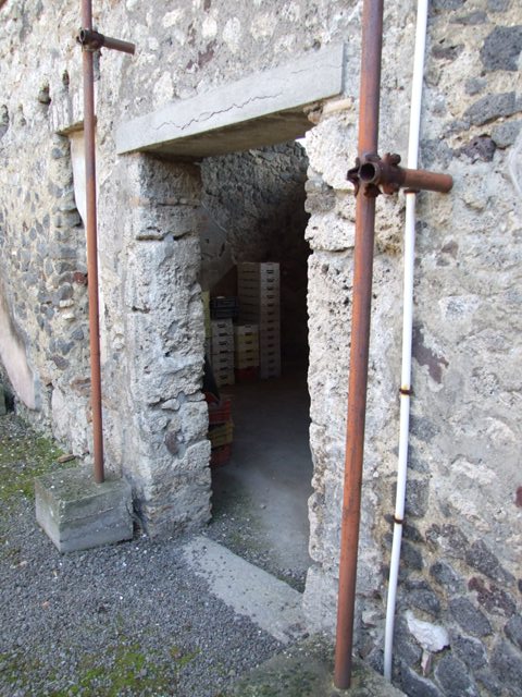 IX.9.c Pompeii.  March 2009.  Doorways to Anteroom in south west corner of Portico.
