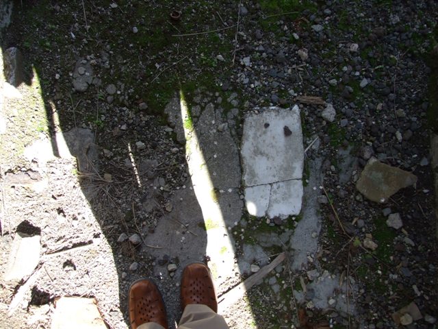 IX.9.f Pompeii. March 2009. Looking east along south wall of small room, with site of staircase and latrine. 
