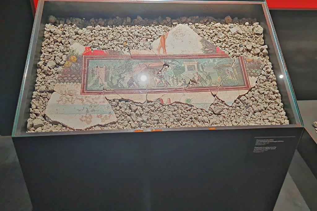 IX.10.1 Pompeii. March 2024.
Fragment of ceiling with painting of a Nilotic scene, on display in an exhibition in the Palaestra entitled –
“L’altra Pompei, vite comuni all’ombra del Vesuvio”. Photo courtesy of Giuseppe Ciaramella.