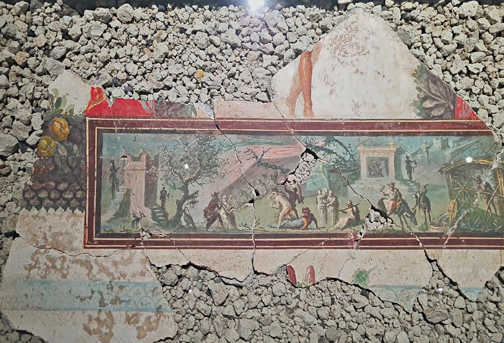 IX.10.1 Pompeii. March 2024.
Detail of fragment of ceiling with painting showing a wayfarer in a Nilotic scene, on display in an exhibition entitled –
“L’altra Pompei, vite comuni all’ombra del Vesuvio”. Photo courtesy of Giuseppe Ciaramella.