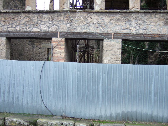 IX.12.4 Pompeii. May 2010. Detail of painted east wall in room being excavated, on west side of bakery at IX.12.6. 
